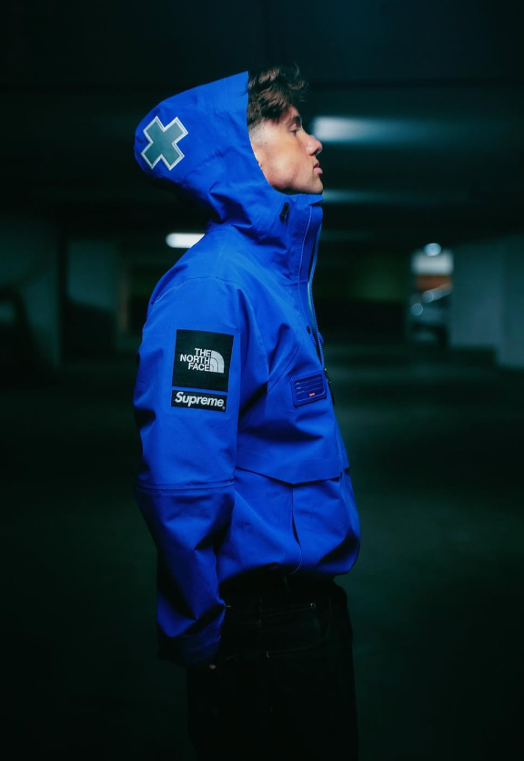 Supreme x The North Face blue jacket, side profile
